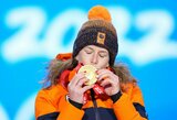 13-ą olimpinį medalį iškovojusi I.Wust pavijo O.E.Bjoerndaleną: priekyje – tik M.Bjoergen