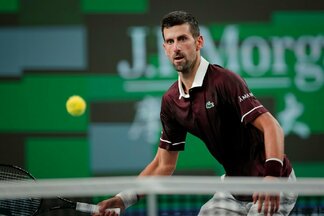 Novakas Djokovičius prieš Hubertą Hurkaczą | EPA / ALEX PLAVEVSKI nuotr.