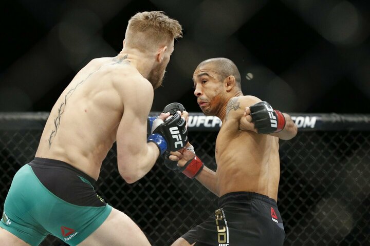 Conoras McGregoras ir Jose Aldo | Scanpix nuotr.