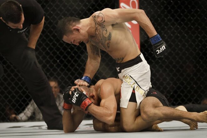 Jose Aldo ir Maxo Holloway dvikova | Scanpix nuotr.