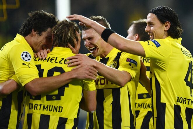 Triumfuojantys Dortmundo „Borussia“ komandos futbolininkai | AFP/Scanpix nuotr.