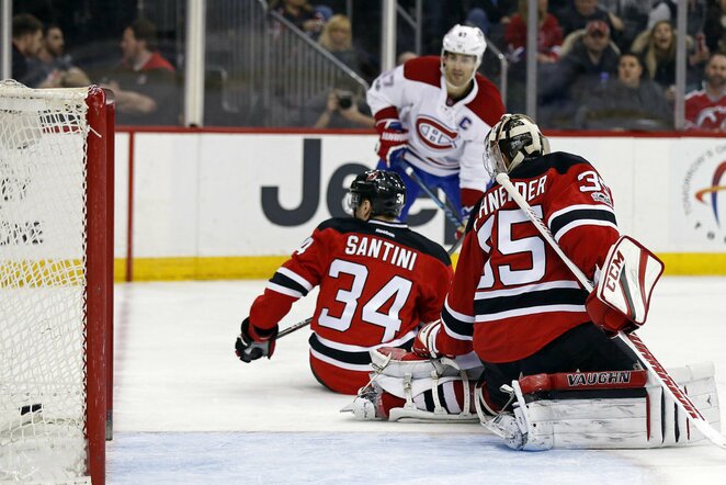 „Devils“ - „Canadiens“ rungtynių akimirka | Scanpix nuotr.