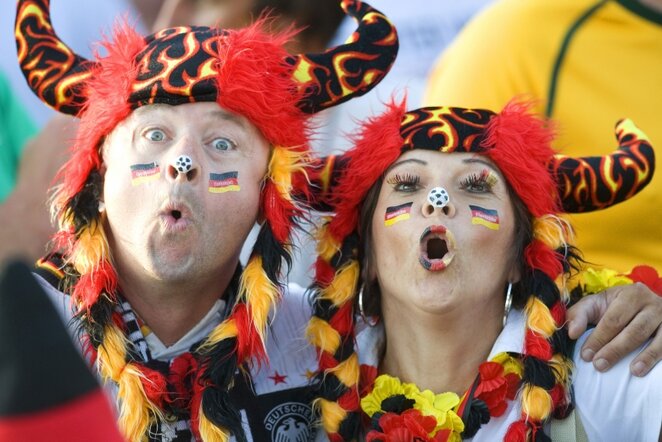 Vokietijos rinktinės sirgaliai visada būna labai spalvingi | Reuters/Scanpix nuotr.
