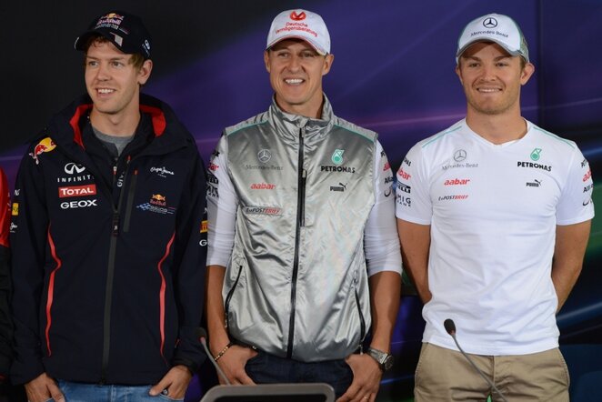 Sebastianas Vettelis, Michaelis Schumacheris, Nico Rosbergas | AFP/Scanpix nuotr.