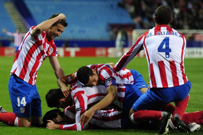 „Atletico“ futbolininkai džiaugiasi pelnytu įvarčiu | AFP/Scanpix nuotr.