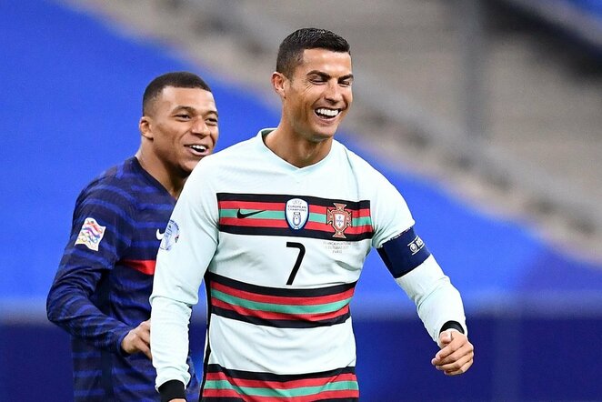Kylianas Mbappe ir Cristiano Ronaldo | Scanpix nuotr.