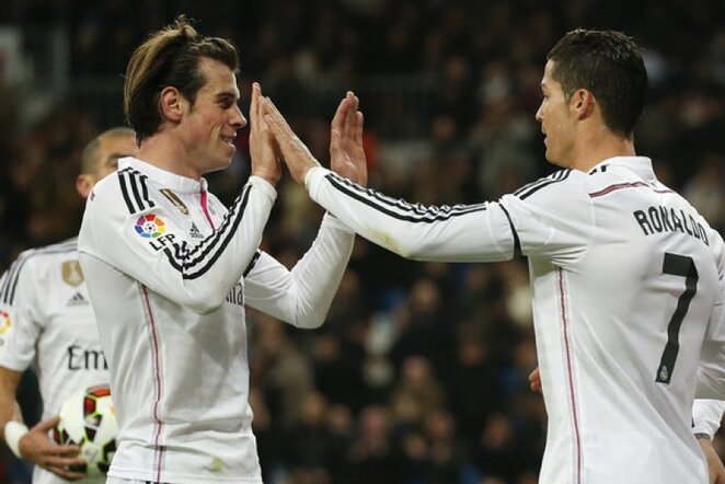 Garethas Bale'as (kair.) ir Cristiano Ronaldo (deš.) | Reuters/Scanpix nuotr.