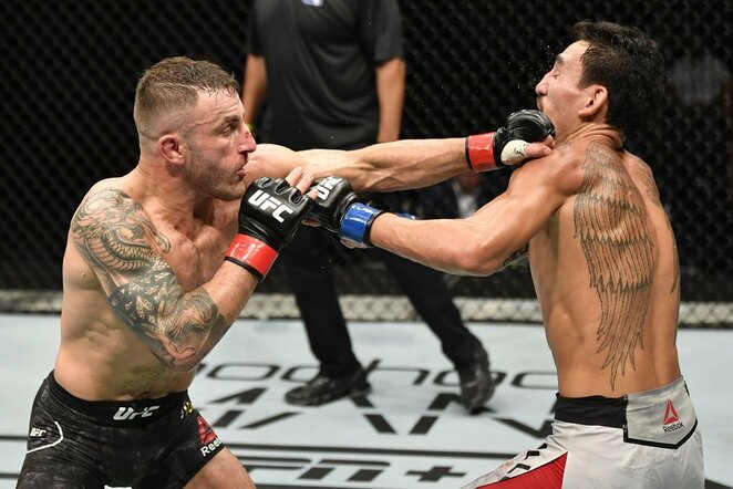 Alexanderis Volkanovskis ir Maxas Holloway | Scanpix nuotr.