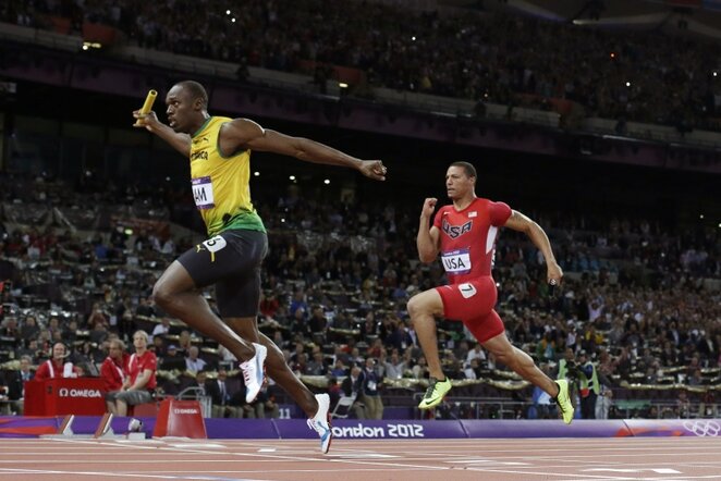Usainas Boltas (kairėje) | AP/Scanpix nuotr.