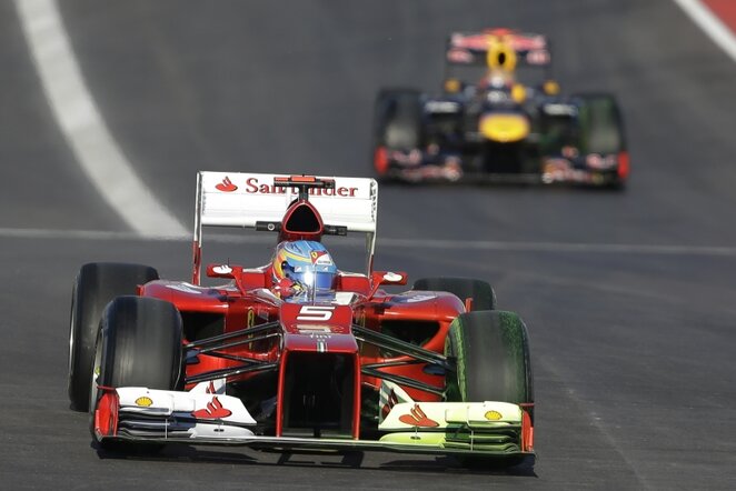 Fernando Alonso ir Sebastianas Vettelis | AP/Scanpix nuotr.