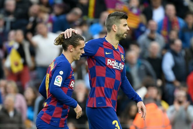 Gerardas Pique ir puolėjas Antoine'as Griezmannas (kairėje) | Scanpix nuotr.