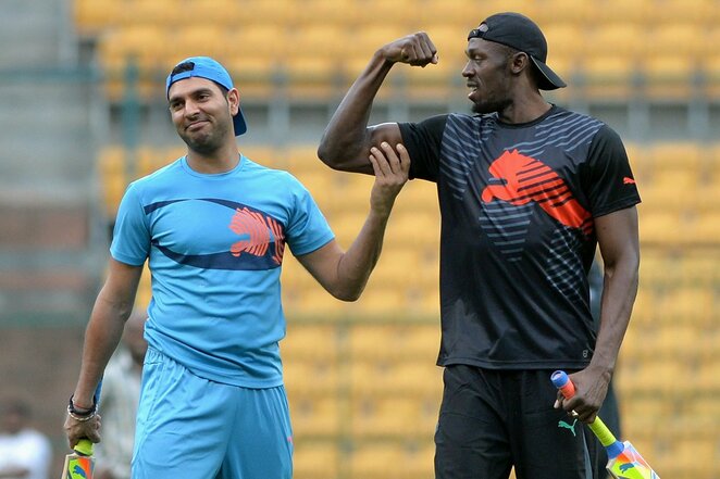 Yuvrajus Singhas ir Usainas Boltas | Scanpix nuotr.